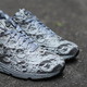 Illustration for article titled These lunar shoes make you feel like youre walking on the moon